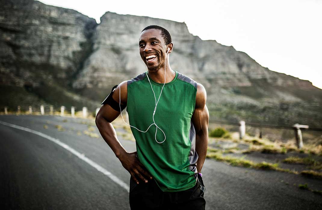 A man smiles after a workout