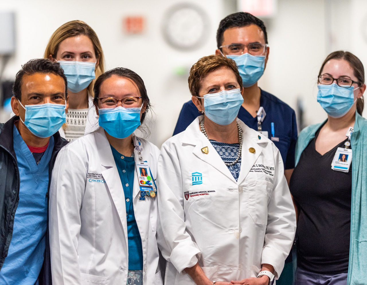 Group of providers wearing a mask