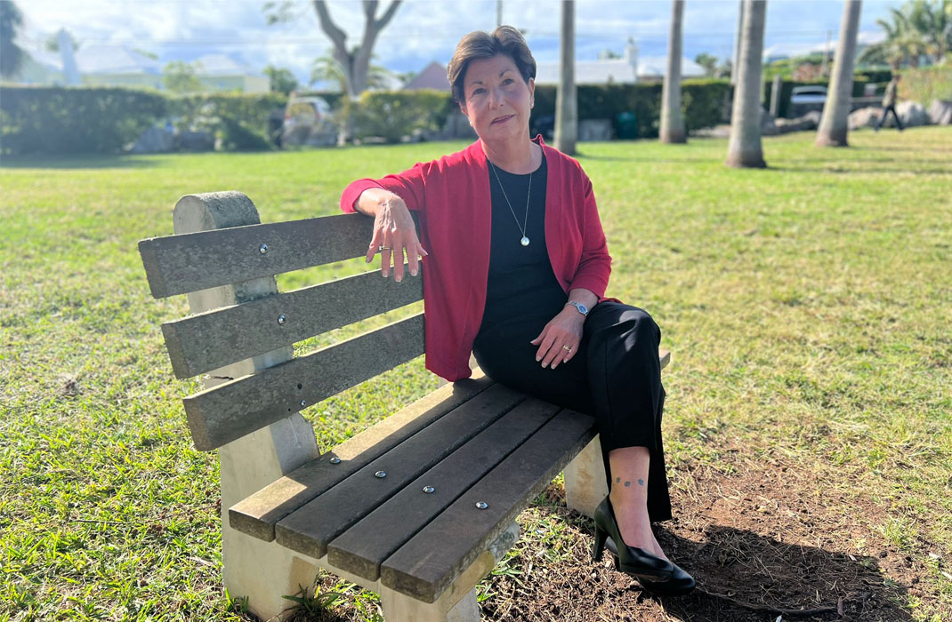 Penelope Perry sitting on a bench