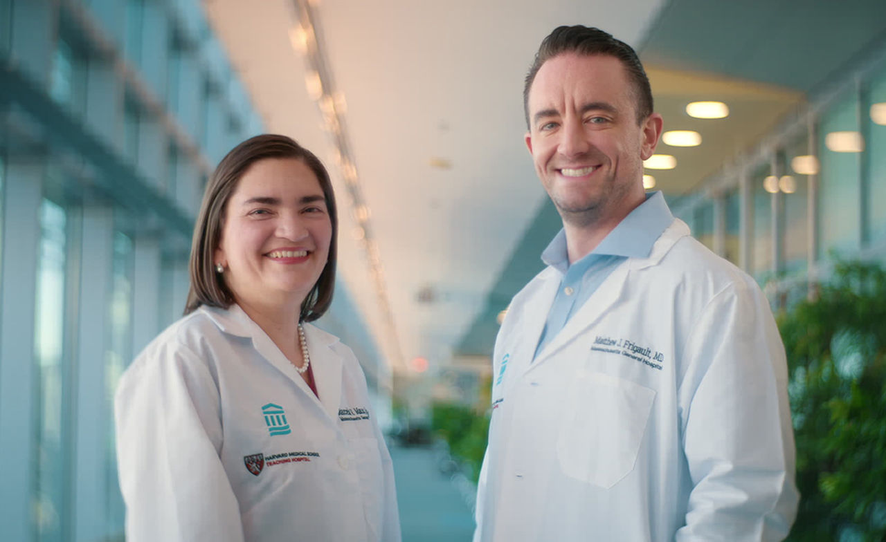 Marcela Maus, MD, PhD standing with Matthew Frigault, MD